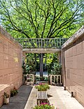 Image 83Ash tree behind a columbarium in Mount Auburn Cemetery